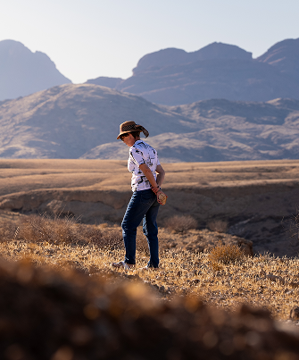 Lady walking in Namibia safari